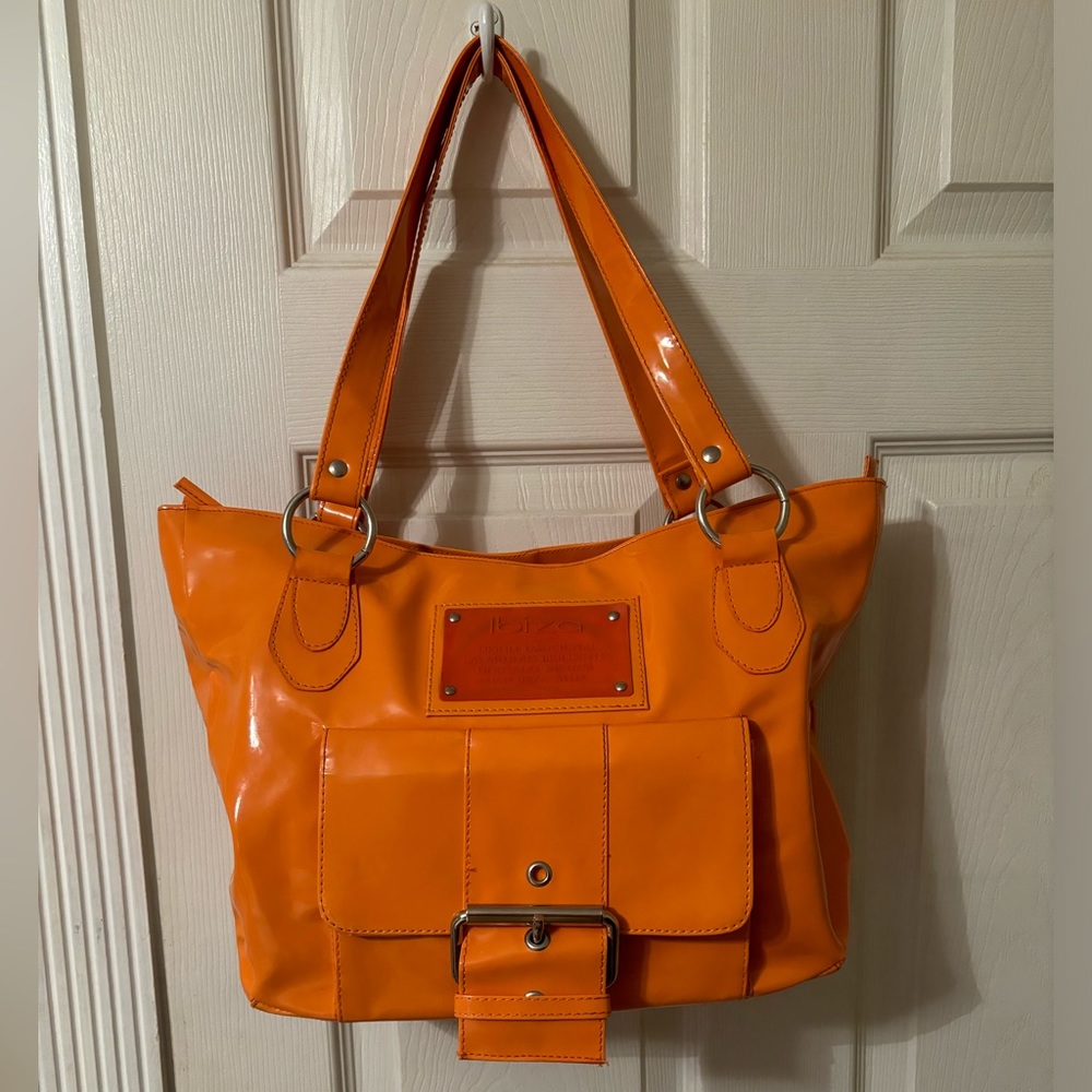 Jaime Ibiza orange shoulder bag.